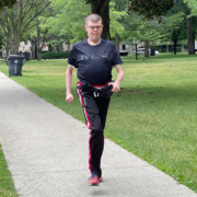 Man jogging on sidewalk